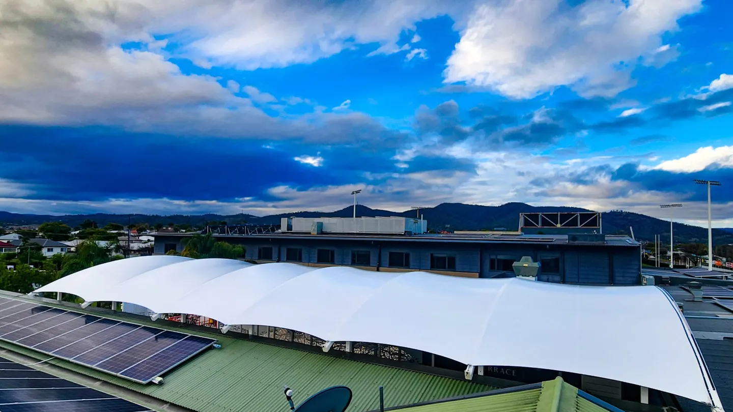 White commercial shade sail structure over a rooftop terrace at a Tamworth business - New England Shade Sails, Tamworth